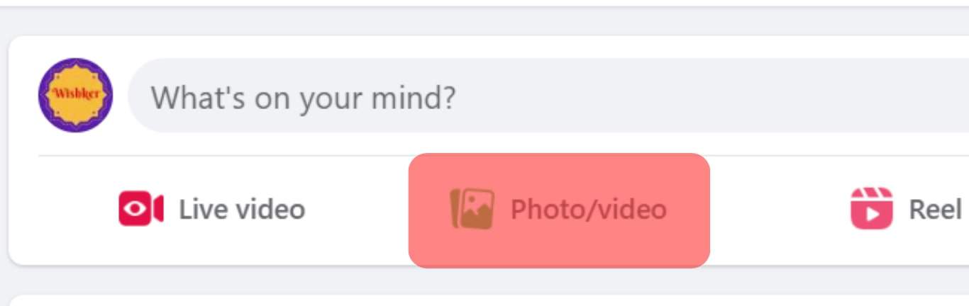Click The Photos Videos Icon Under Your Status.