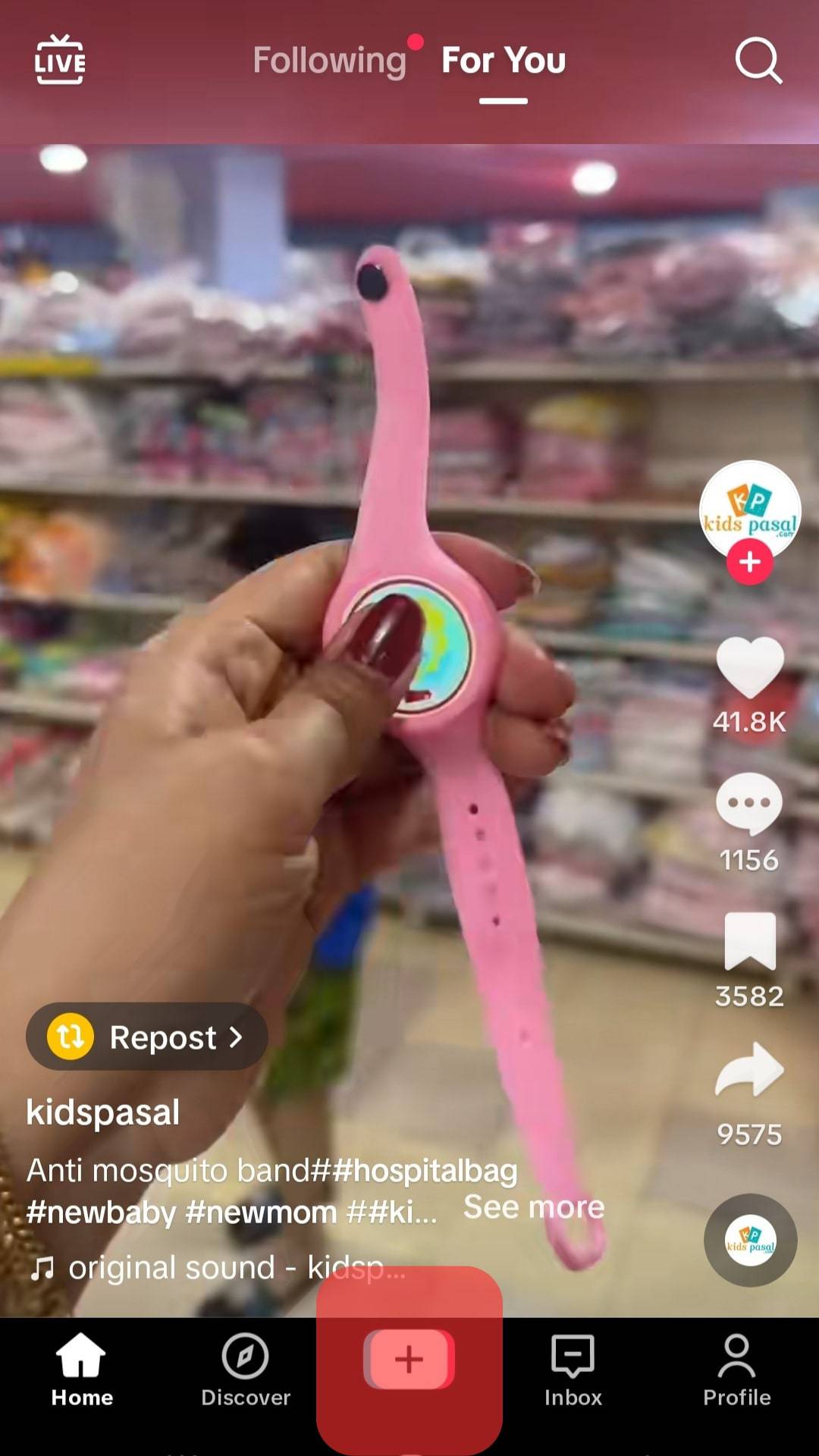 Open Tiktok And Click The + Icon.