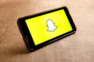 How To Add Camera Roll To Snapchat Story