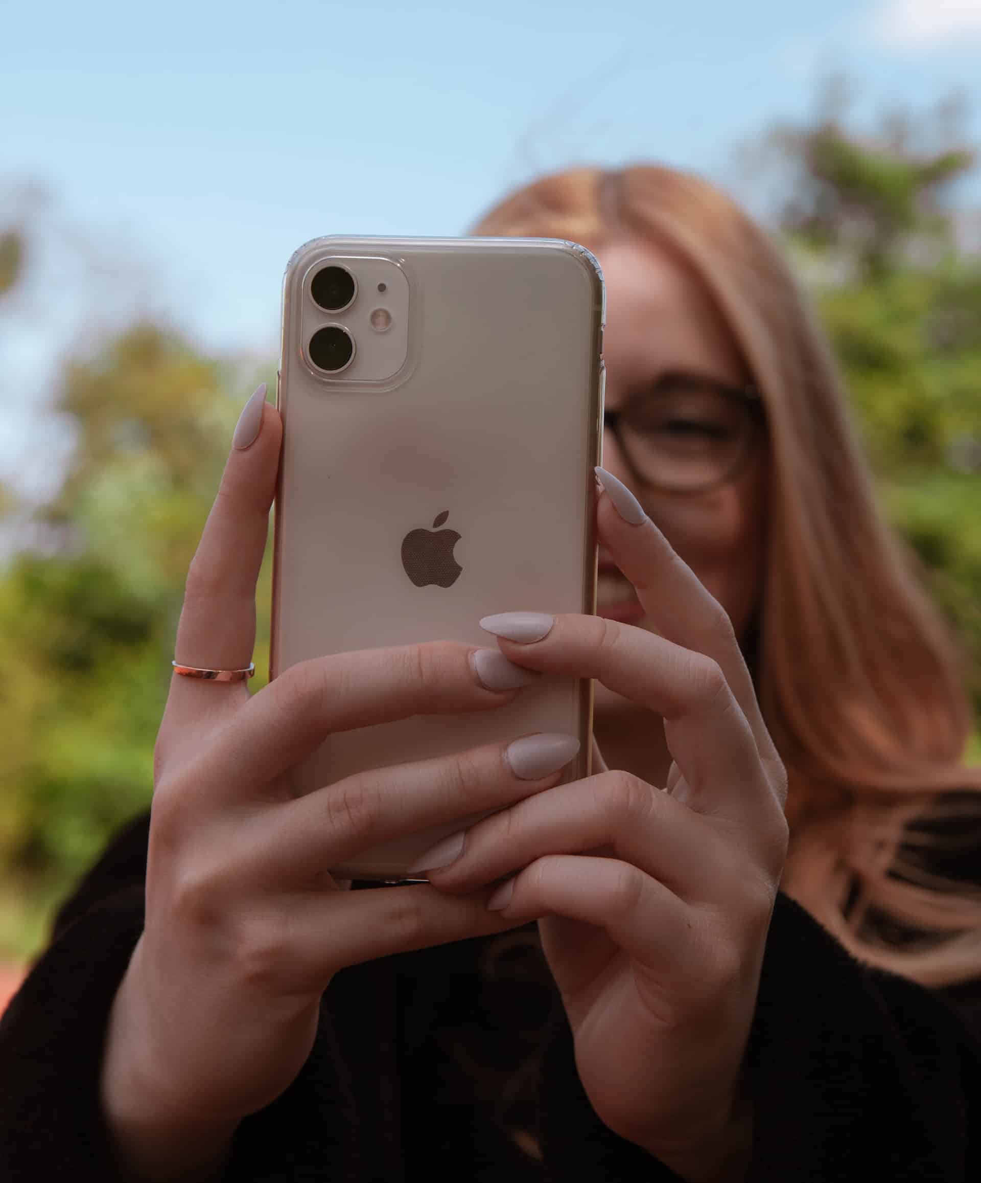 Person Watching The Iphone Screen